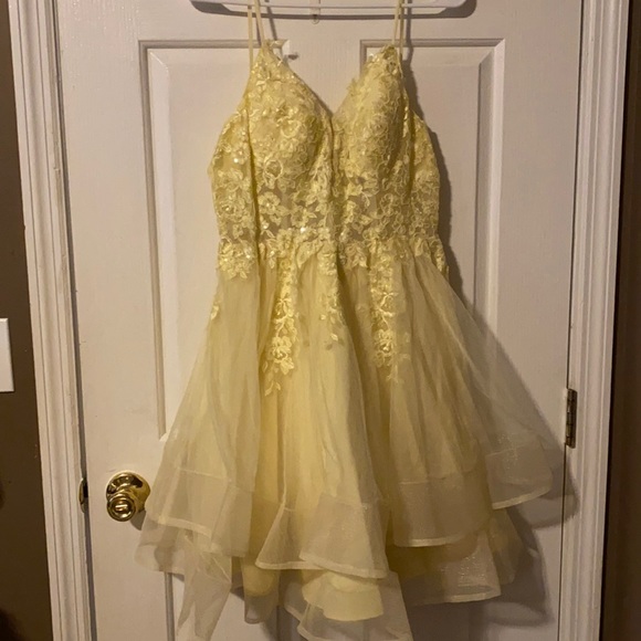 Yellow homecoming dress. Worn once. Has padding and is super pretty! - Picture 1 of 4